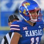 Kansas tops UNLV 49-36 in penalty-filled Guaranteed Rate Bowl