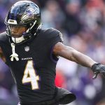Jackson Dominates as Ravens Rout Dolphins, Clinch AFC’s No. 1 Seed
